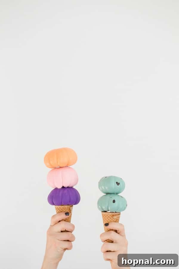 Sweet Autumn: Homemade Pumpkin Ice Cream Cones 2 Adorable DIY pumpkin ice cream cones displayed for charming Halloween decor