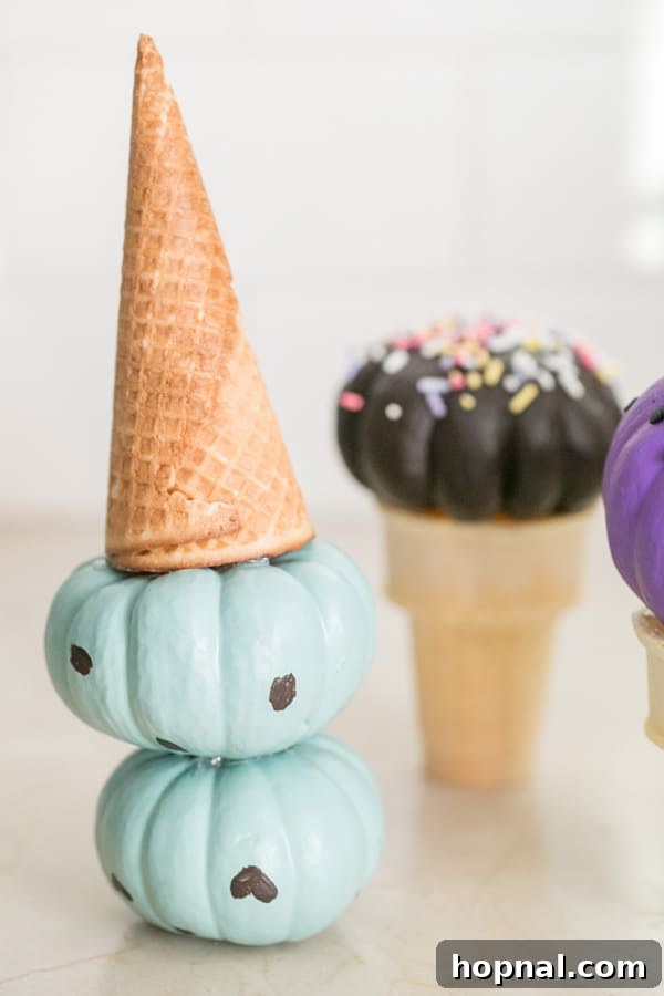Sweet Autumn: Homemade Pumpkin Ice Cream Cones 3 Assortment of painted mini pumpkins drying, ready to become delightful ice cream cones