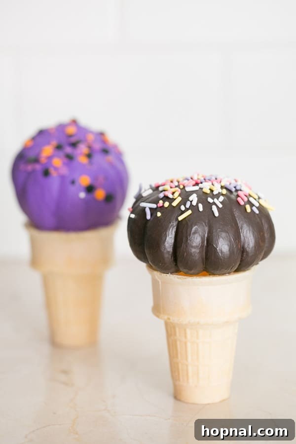 Sweet Autumn: Homemade Pumpkin Ice Cream Cones 4 Close-up of a perfectly painted mini pumpkin, resembling a delicious ice cream scoop