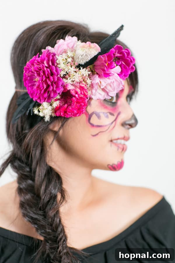 Effortless Día de los Muertos Makeup & DIY Flower Crown Guide 6 Model wearing a vibrant floral crown and delicate Day of the Dead makeup