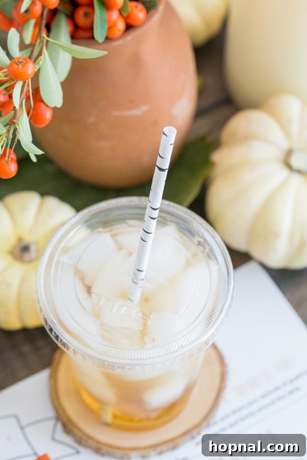 Little Gobblers' Thanksgiving Table 5 A cup with a birchwood straw, ready for a child's Thanksgiving drink.
