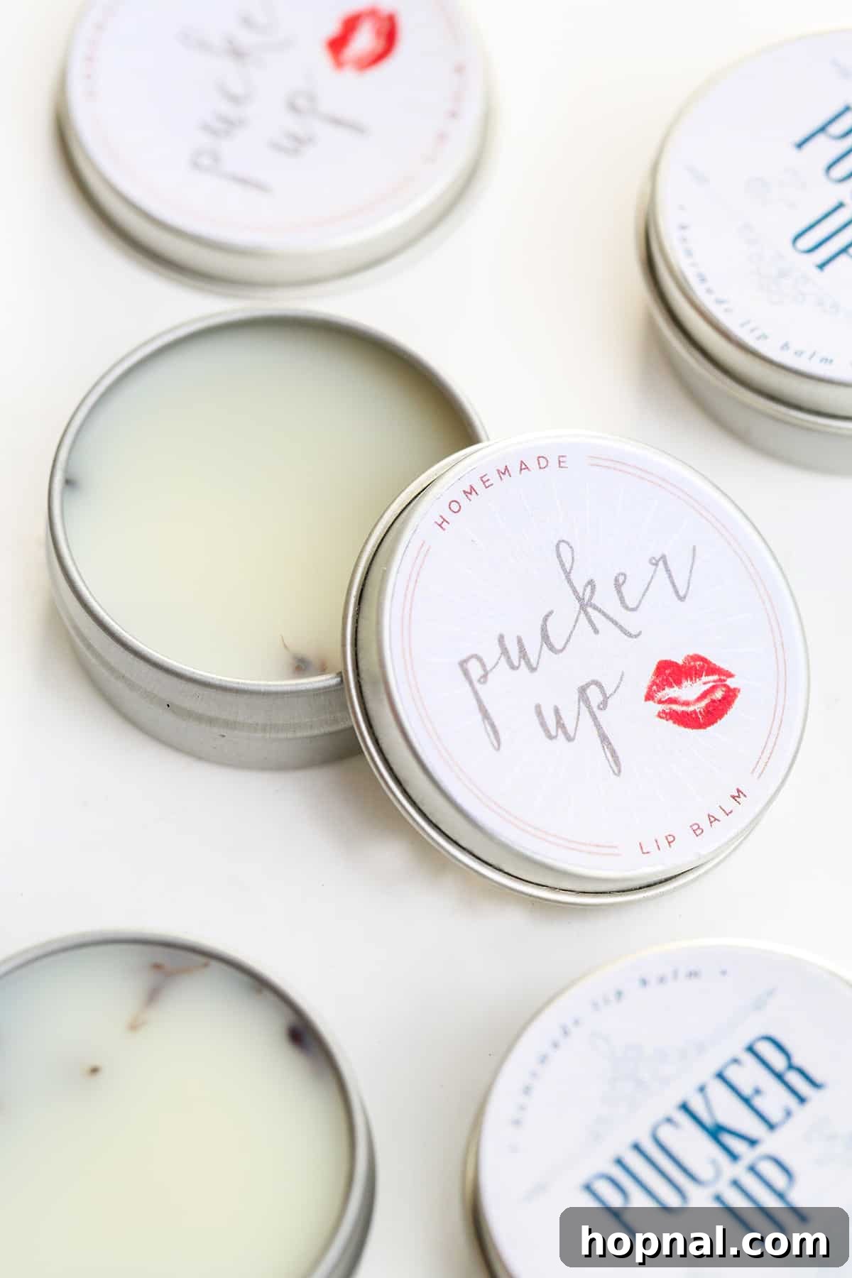 Homemade DIY lavender lip balm in tins, perfect for Valentine's Day gifts