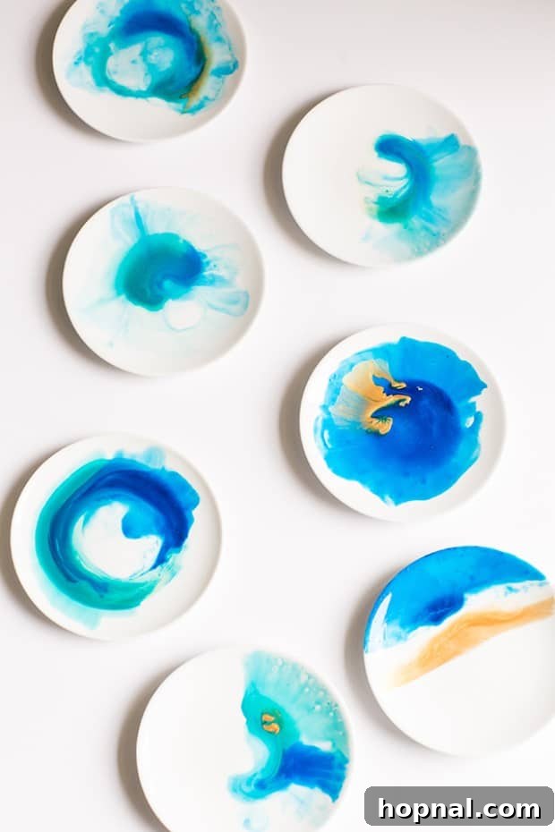 Close-up of abstract watercolor patterns on dinner plates