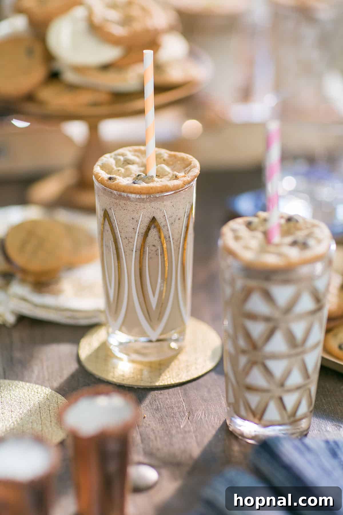 boozy cookie milkshake topped with a cookie