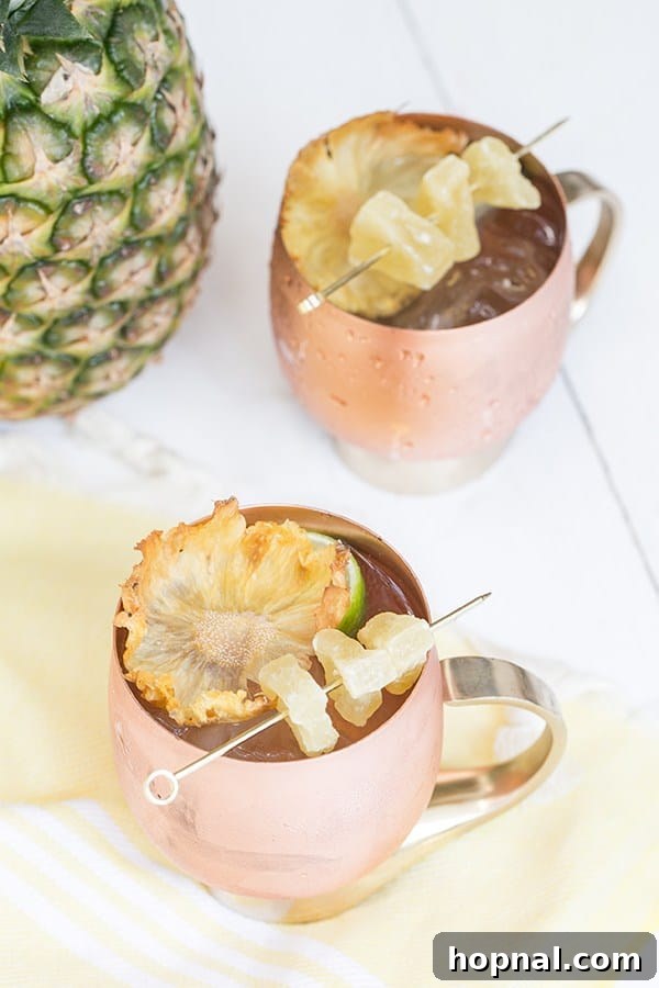 A refreshing Pineapple Moscow Mule, perfectly garnished and ready to be enjoyed.