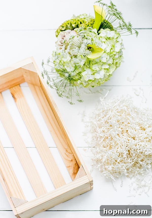 wooden gift box, flowers and shredding