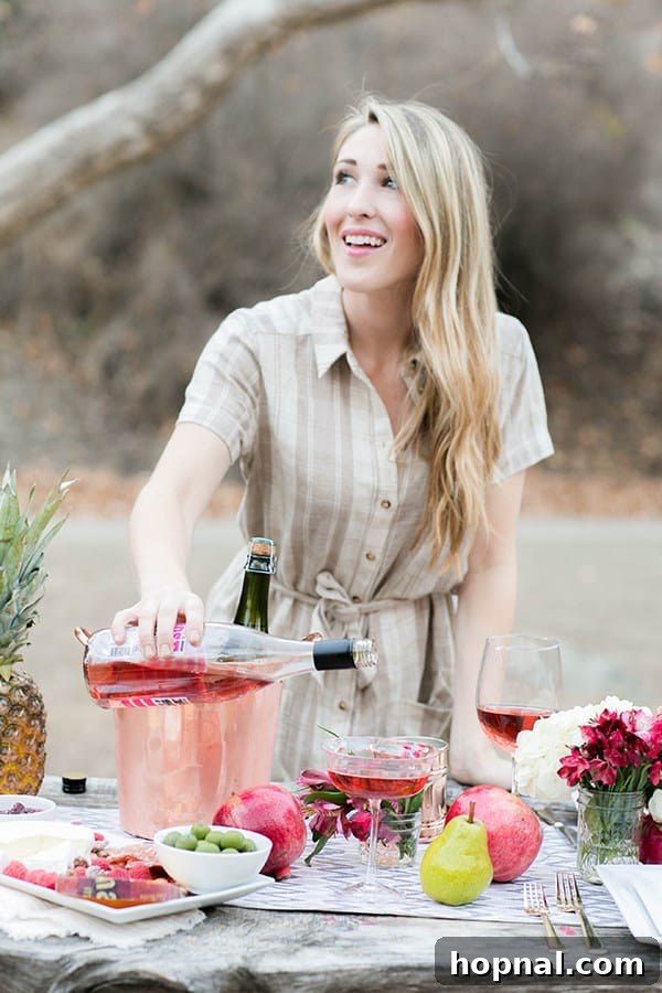 A person serving refreshing drinks, possibly cocktails, during a Thanksgiving glamping experience.