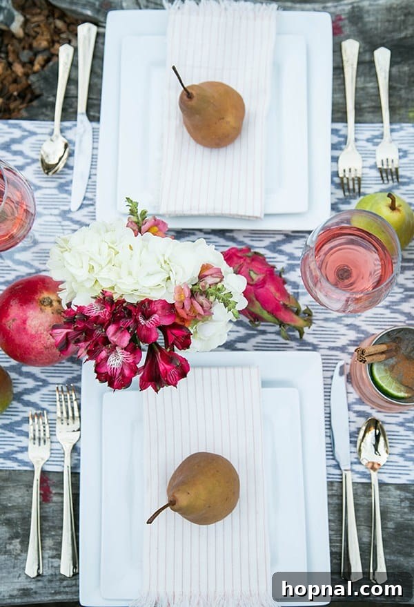 An overhead shot of pears arranged on a table, serving as simple yet elegant decor for a Thanksgiving camping meal.
