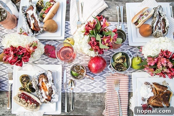 An inviting overhead shot of a beautifully laid-out Thanksgiving table spread at a glamping site, showcasing the festive atmosphere.