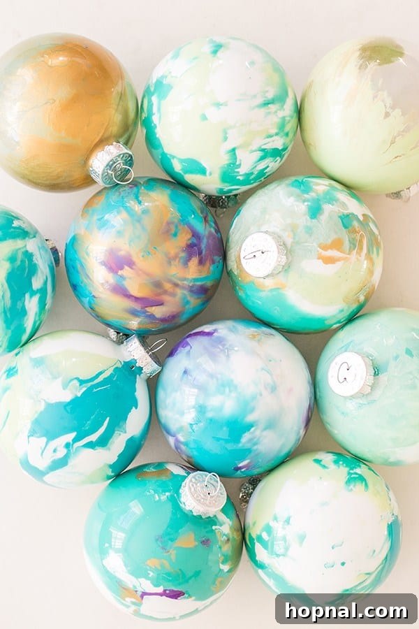 Top-down view of Marbled Christmas Ornaments drying