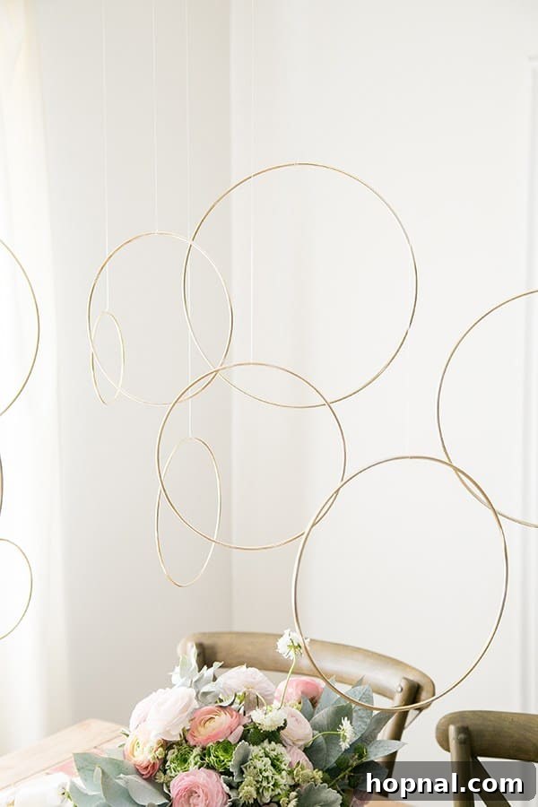 Close-up of elegant gold rings as part of New Year's Eve dinner decor, reflecting festive lights.