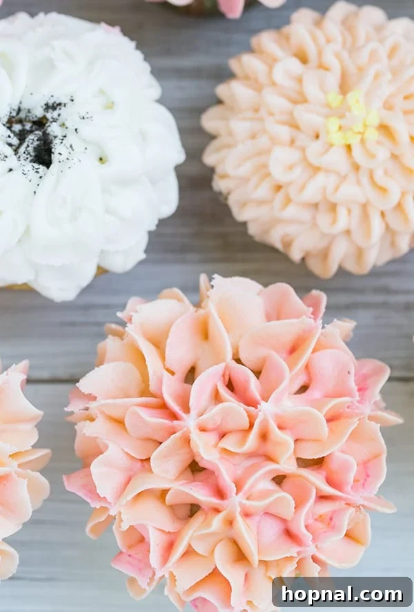 close up shot of floral cupcake - vanilla frosting