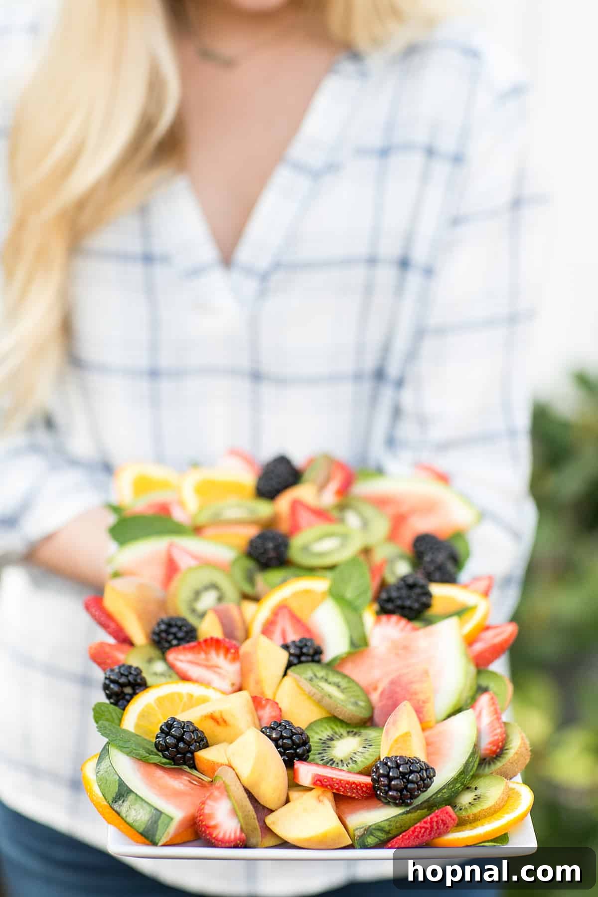 Refreshing and colorful fruit salad, a perfect side dish for an Easter brunch, adding a healthy and vibrant touch to the meal.