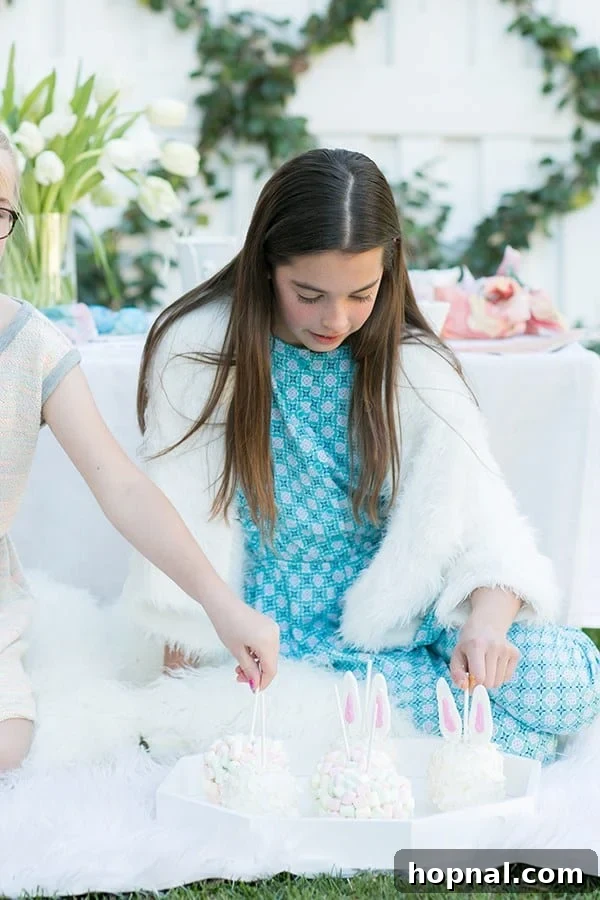 Dyeing for Easter Fun 20 Two cheerful girls excitedly reaching for candy apples at a lively Easter party, eager for their sweet treats.