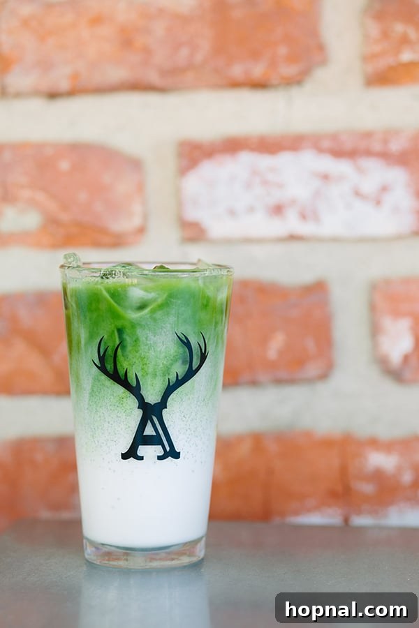 Matcha latte in a tall glass