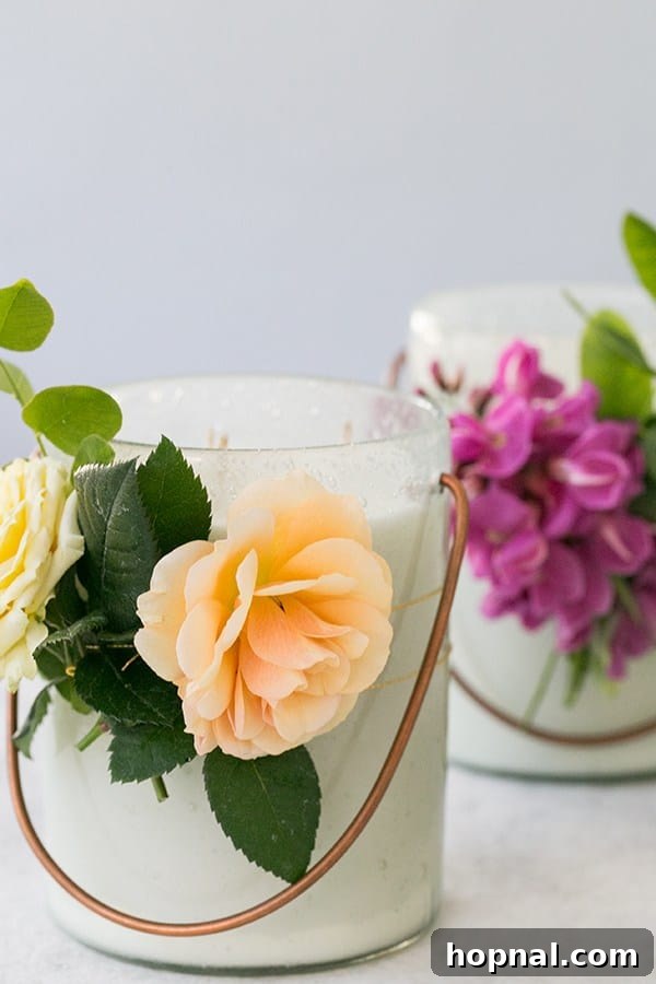 Candle with flowers tied around the glass - scented candles, soy wax, candle making, candle wax, slow burning wax, paraffin wax, melted candle wax, homemade candle