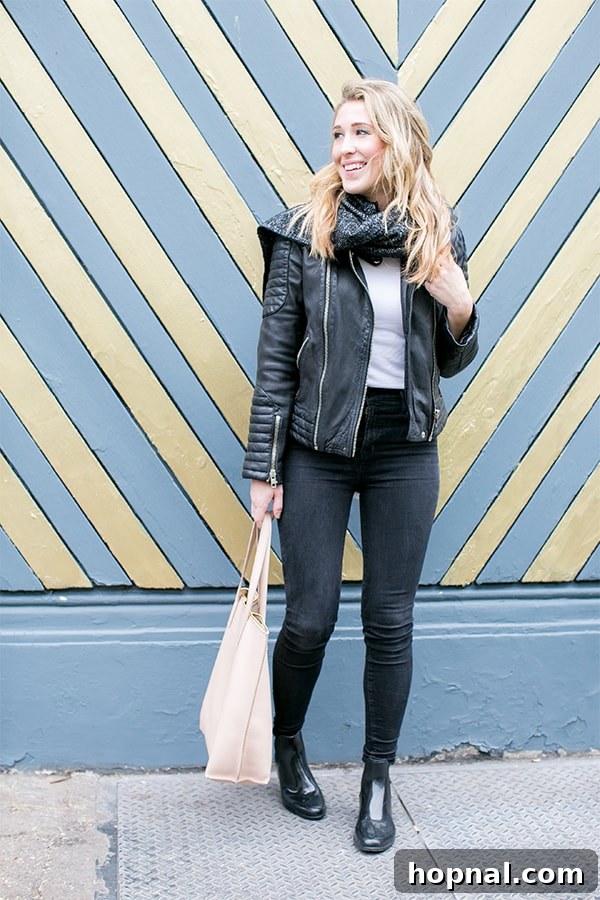 A woman posing elegantly on a London street