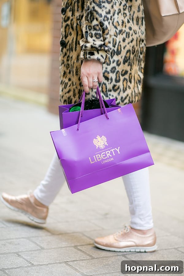A stylish purple shopping bag from Liberty London