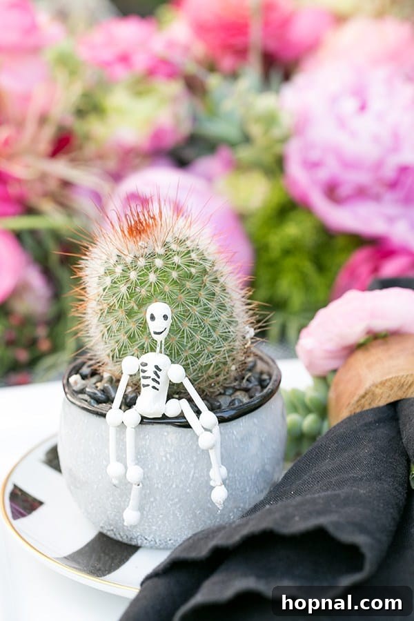 Spice Up Your Cinco de Mayo Celebration 16 Succulent in a vase with a tiny skeleton sitting on the edge.