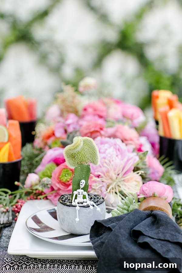 Spice Up Your Cinco de Mayo Celebration 3 Cactus plant with a tiny skeleton and pink flowers on a black and white table for Cinco de Mayo.