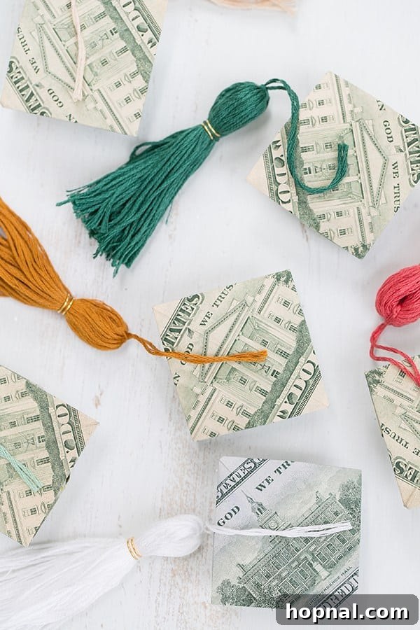 Cash Creations for Grads: Caps & Tassels 2 Handcrafted origami money graduation cap with a DIY tassel, displayed creatively as a unique graduation gift.