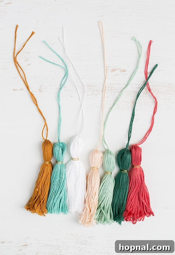 Cash Creations for Grads: Caps & Tassels 6 Illustrative image showing how to tie a secondary loop around the tassel to define its shape and head.