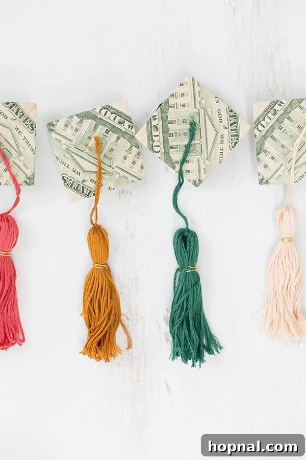 Cash Creations for Grads: Caps & Tassels 8 A beautifully decorated table spread for a graduation party, featuring celebratory drinks and themed decor elements.