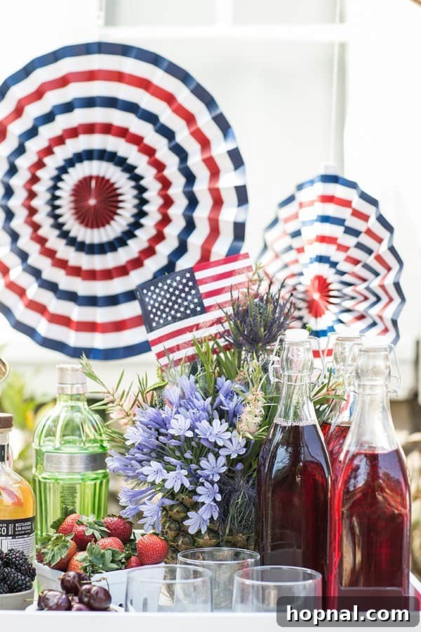 Stars Stripes and Spiked Slushies 8 An inviting snow cone bar featuring an array of colorful syrups, a selection of fine spirits, and festive paper flags, creating a lively and customizable beverage station.