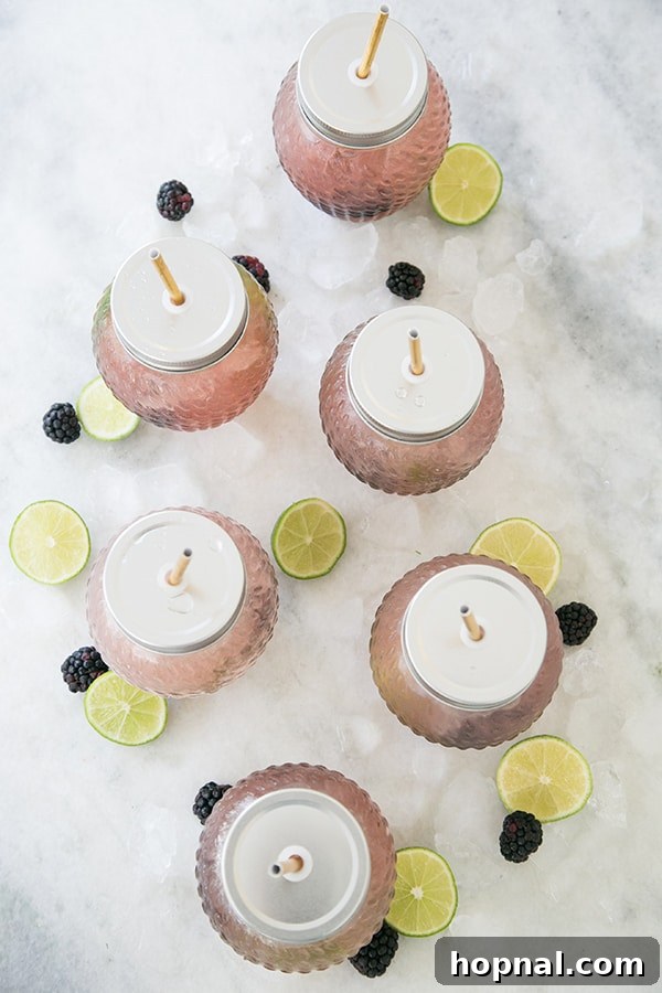shot of blackberry margarita on a table - lime juice