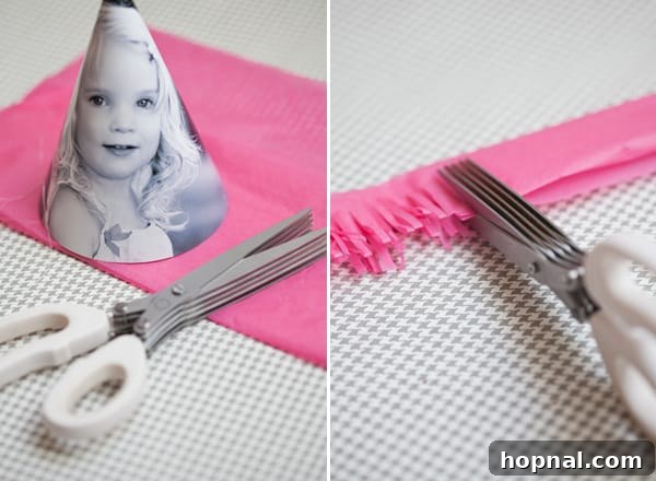 Personalized Photo Celebration Hats 5 A shot of colorful tissue paper being precisely cut with scissors to create decorative fringe for a party hat.