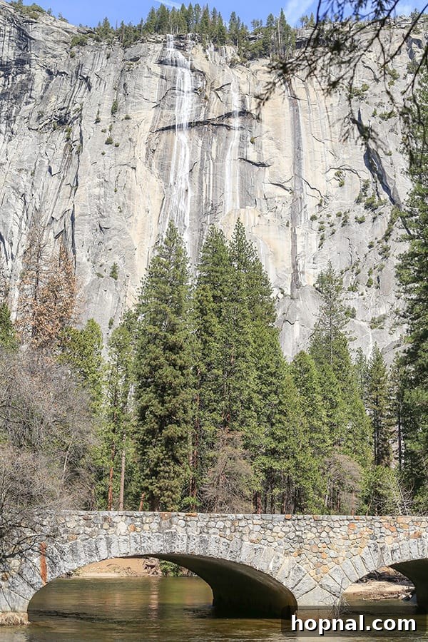 Little Explorers, Big Yosemite 8 A beautiful waterfall cascading down rock formations in Yosemite National Park