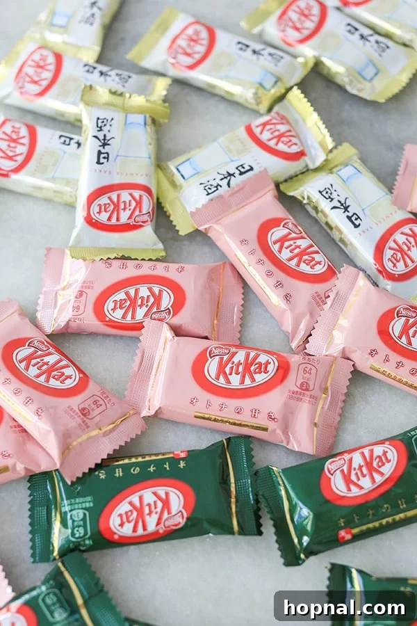 Sweet Sushi Delights with Kit Kat 4 A colorful selection of unique Kit Kat flavors from Japan, including matcha, strawberry, and sake, ready to be transformed into candy sushi.