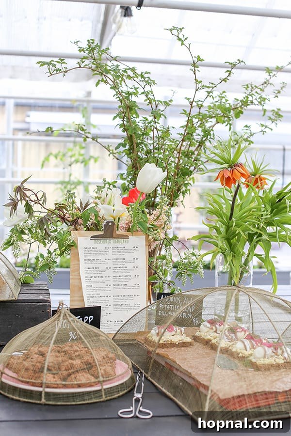 Assortment of food and drinks on a wooden table in the cafe