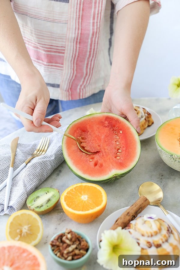 Effortless Brunch Bliss 6 A spoon scooping a refreshing bite of watermelon, symbolizing the ease and enjoyment of the brunch concept.