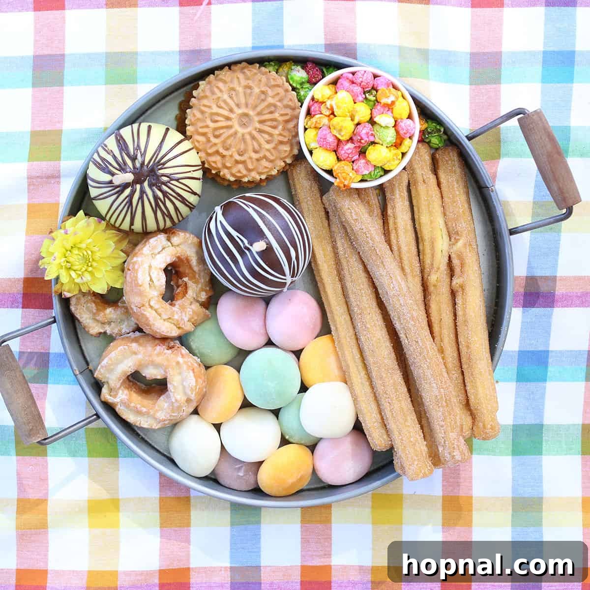 Backyard Big Top Bash 6 Colorful carnival dessert platter featuring donuts, churros, and candied apples