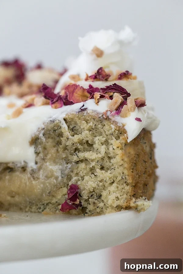 Super Moist Banana Cake Made with Oil 5 A perfectly cut slice of incredibly moist banana cake made with oil, revealing its tender, flavorful crumb.