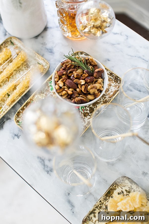 A bowl of assorted nuts, elegantly presented as a simple and complementary snack on a holiday drink station
