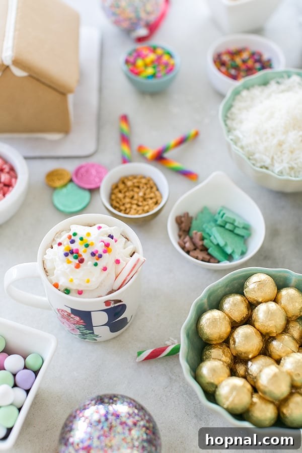 Your Ultimate Guide to an Epic Gingerbread House Decorating Party 4 shot of hot cocoa on a table with candies around it - gingerbread house decorating party, party started