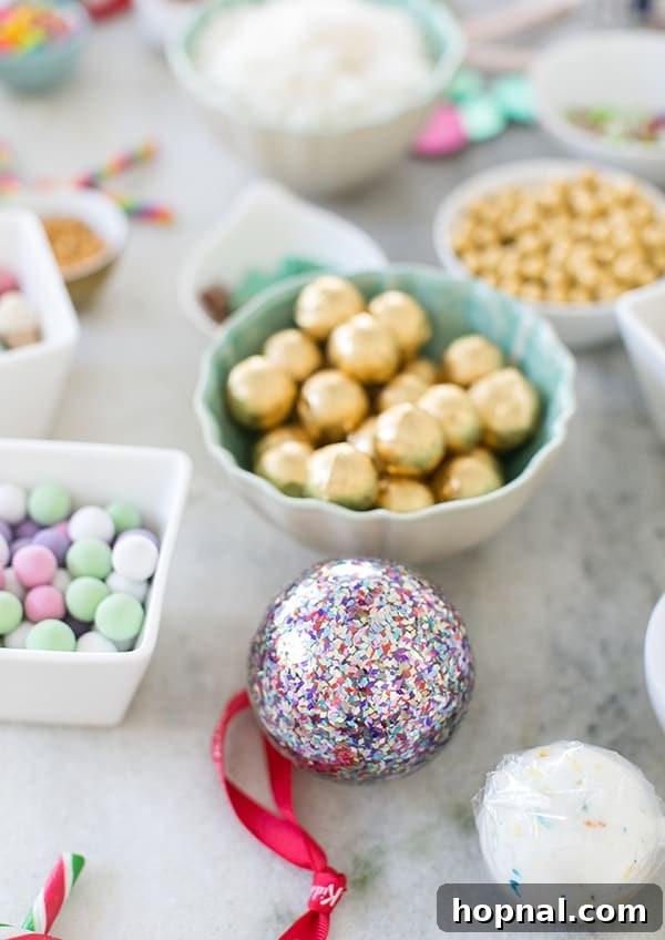 Your Ultimate Guide to an Epic Gingerbread House Decorating Party 7 shot of Christmas bauble on a table - graham crackers, guests arrive