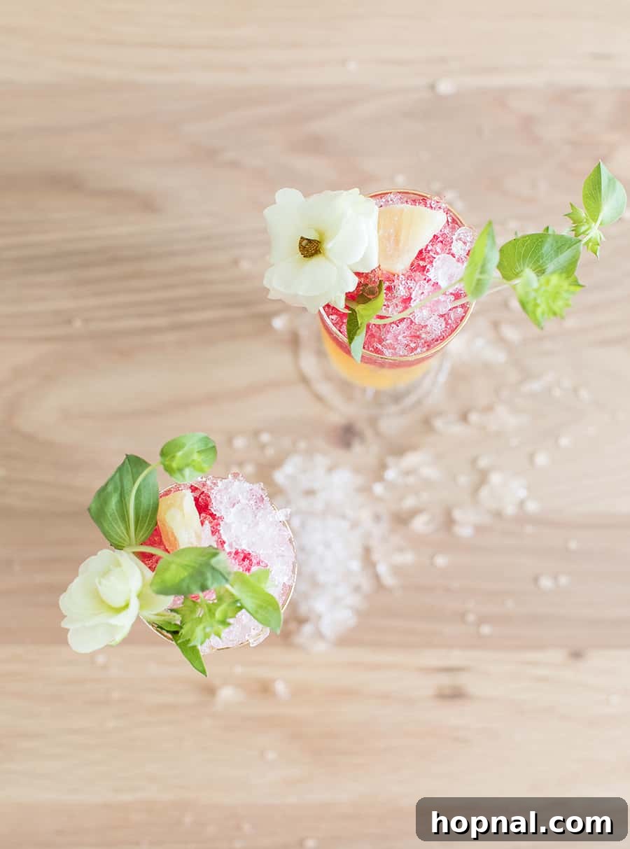 Agave Kissed Pineapple Tequila 5 Refreshing Pineapple Tequila Cocktail with fresh pineapple chunks and flowers