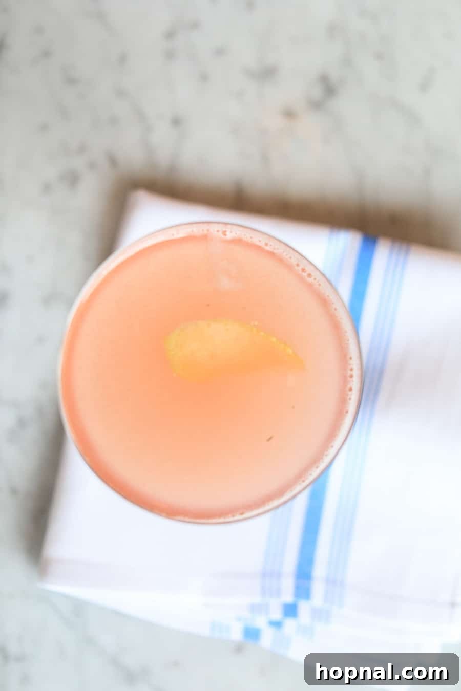 Carmel By The Sea: 10 Must-Experience Wonders 17 Pink cocktail on white and blue napkin