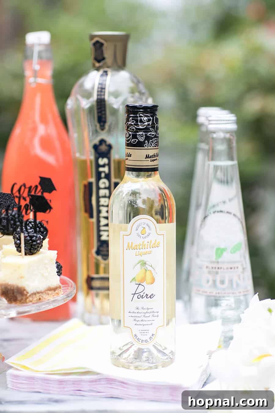 Pear liqueur on napkins for a graduation party