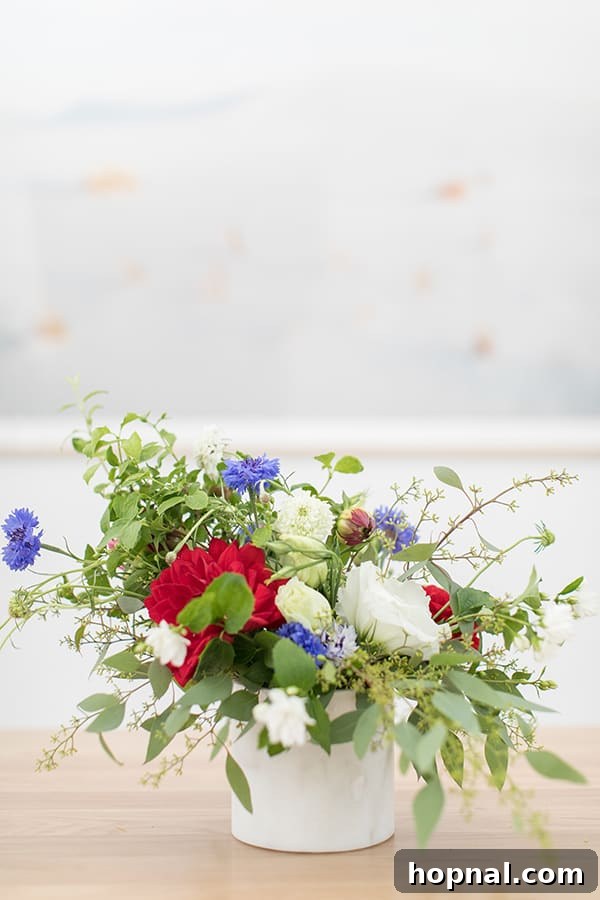 Vibrant red, white, and blue flower arrangement for a 4th of July party.