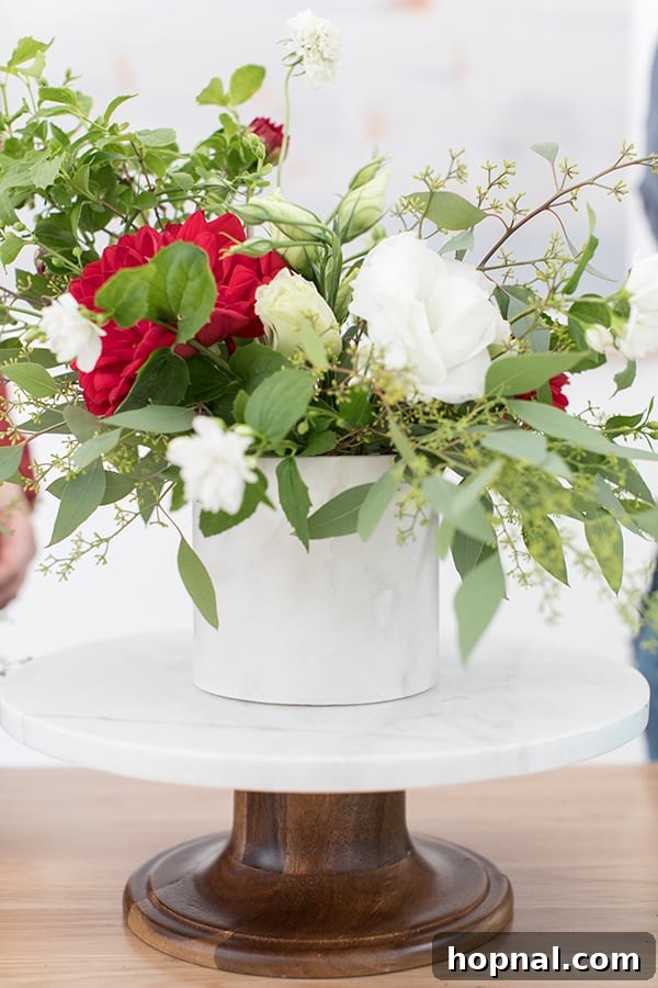A completed elegant 4th of July flower arrangement ready for display.