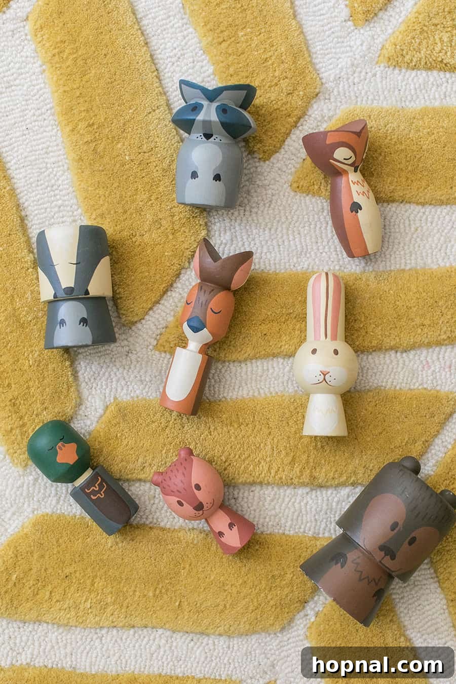 Wooden critters on a yellow rug