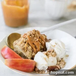 Ultimate Caramel Apple Crumble Bars 8 Caramel Apple Crumble Bars served with vanilla ice cream and crumble topping