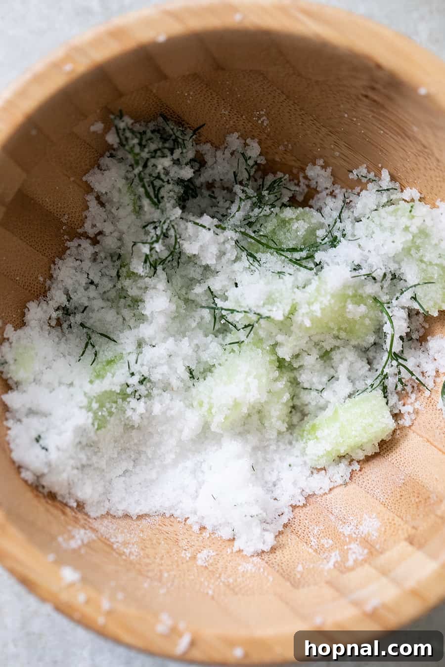 Craft Your Ultimate Home Bloody Mary Bar 9 A bowl of fresh dill and cucumber infused salt, ready to rim glasses for a Bloody Mary.