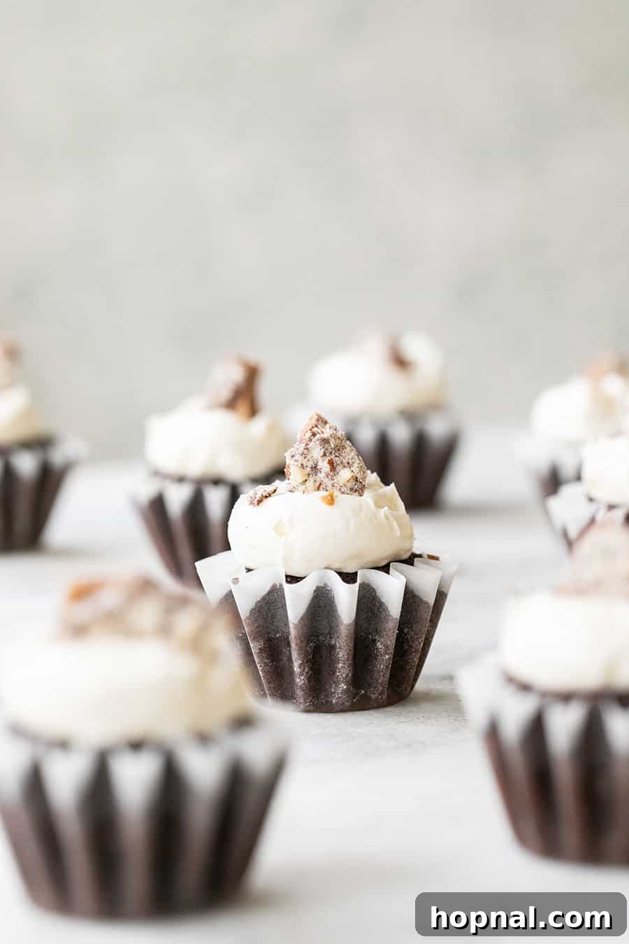 An inviting spread of finished toffee chocolate cupcakes and other festive treats on a table