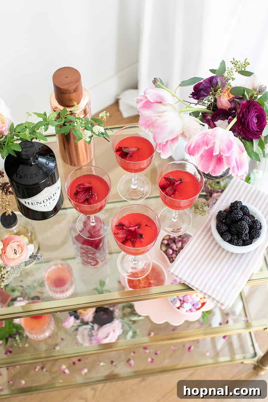 The Gin Blossom Room 12 Overhead of a Gin and Flower Bar with cocktails, gin, berries and more.