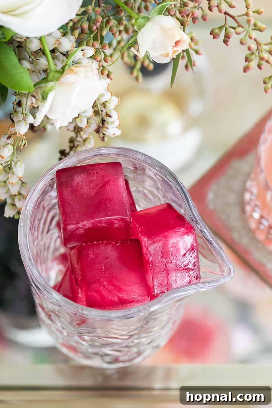 The Gin Blossom Room 6 Naturally dyed pink ice cubes.